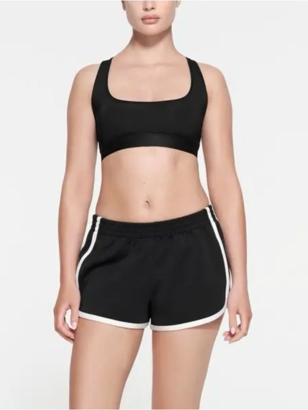 SKIMS Black Track Dolphin Shorts